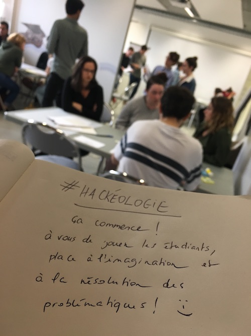 Photo of a notebook with the words: Hackeologie It's time to start! It's up to you, the students, to imagine and solve the problems.